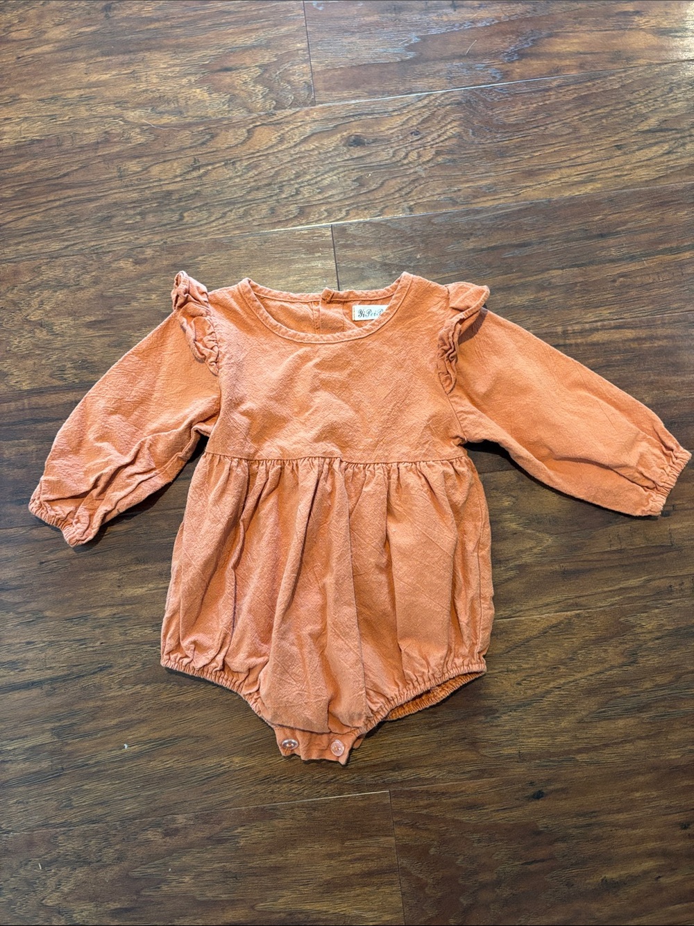 Long Sleeve Ruffle Baby Romper in Rust Orange